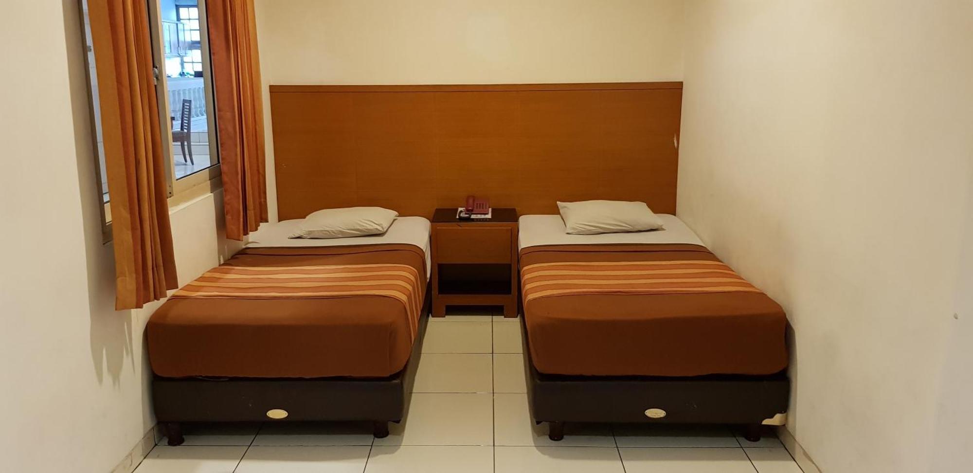 Hotel Dequr Jakarta Kota Bilik gambar
